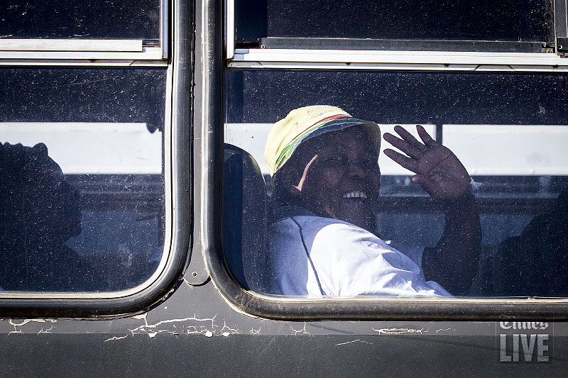 An elderly woman waves as she arrives for the Active Ageing older persons games. Aug 2013