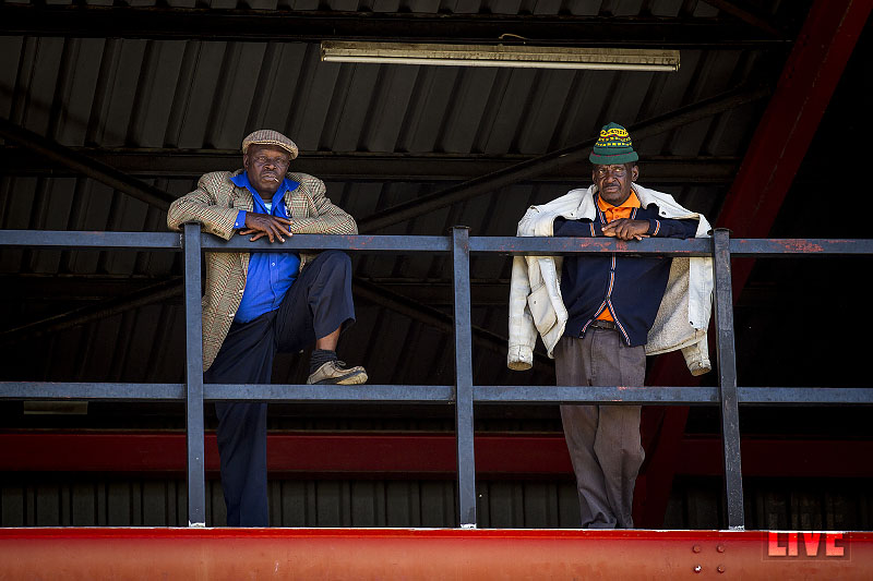 Two spectators watch the action at the Active Ageing older persons games. Aug 2013